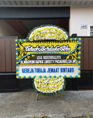 Papan Bunga Duka di 11 Ilir